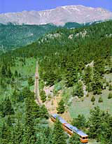 Pikes Peak dominates the mountains just west of Colorado Springs& here the Cog Railway climbs its way towards the mountain.